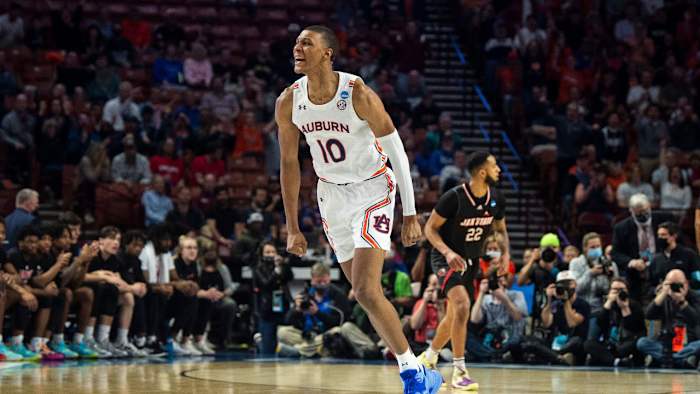 Auburn Tigers forward Jabari Smith (10) celebrates after making a three point basket during the first round of the 2022 NCAA tournament at Bon Secours Wellness Arena in Greenville, S.C., on Friday, March 18, 2022. Auburn Tigers lead Jacksonville State Gamecocks 39-27 at halftime.
